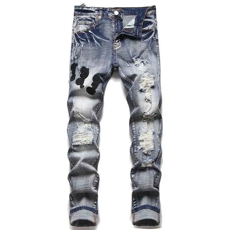 Kakobuy spreadsheet Amiri pants - Amiri Light Wash Distressed Chenille Logo Patch Jeans product image