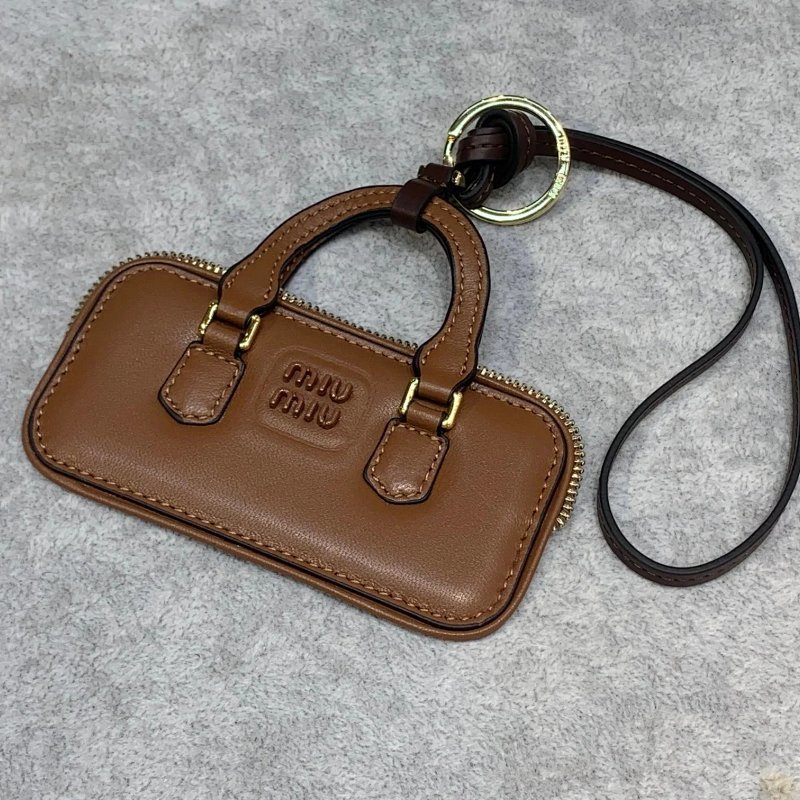 Kakobuy spreadsheet bags - XXX-MIUMIU字母连包挂挂件-4020 product image